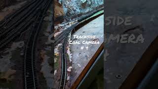 Trackside Camera View of Model Railroad Operations - Train Dropping Off Empty Coal Cars - N Scale