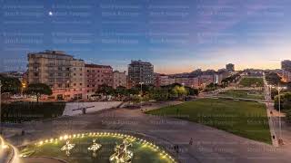 Panorama showing lawn at Alameda Dom Afonso Henriques and the Luminous Fountain aerial day to night