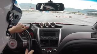 Racing Autocross in a 2010 Subaru STI with Speedhut gauges and OBDII Shift Light