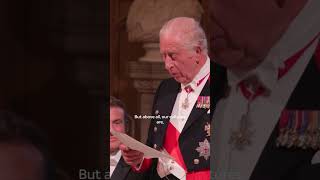 King shows off French skills to Macron