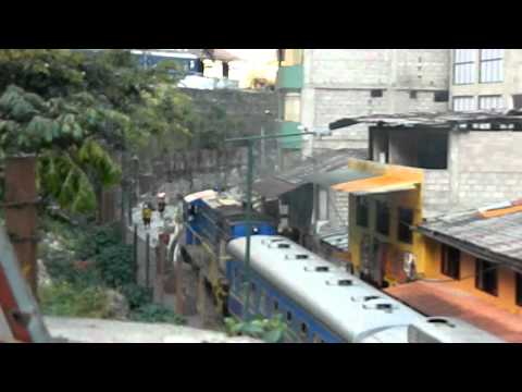 PeruRail train street running in Aguas Calientes, Cusco, Peru