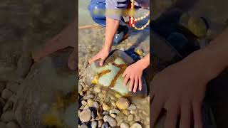 A man mines the stone jade
