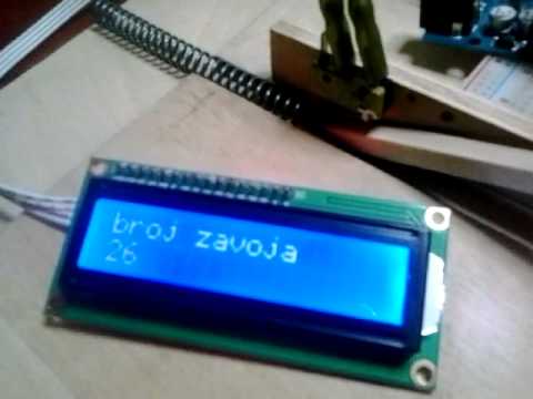 Simple jig for counting compression spring coils