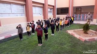 Alzaytoun governmental language school تحية العلم