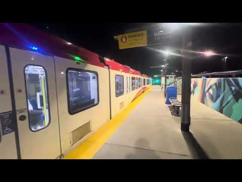 Red Line train departing from Banff Trail Station