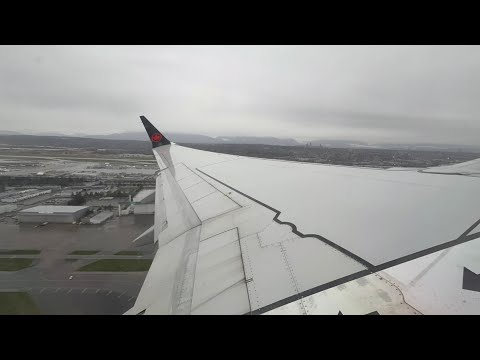 AC222 rainy and blurry afternoon takeoff YVR