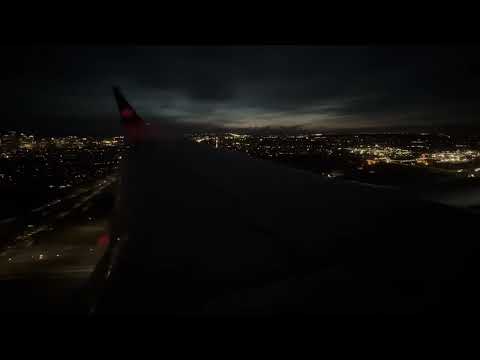 AC222 glowing downtown view landing YYC