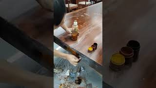 Wooden table repair process.
