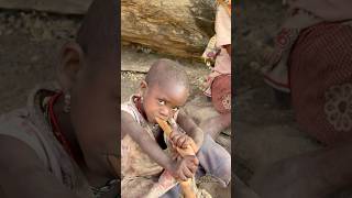 Raw & Real: Hadza Tribe Girl Eats Huge Animal Intestines #hadzabetribe #food