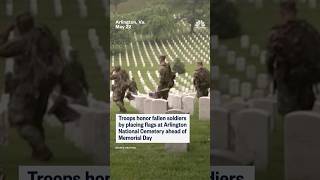 Troops place flags at Arlington ahead of Memorial Day