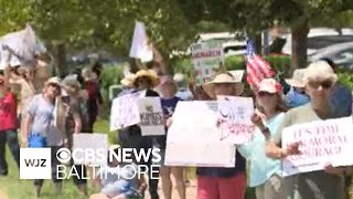 Protesters gather in parts of Maryland for "the Good Trouble Lives On" rally