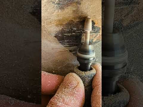 Massaging an epoxy filled void on a live edge to match the curvature. #dremel #shorts