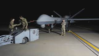 Airmen load GBU-39 Small Diameter Bombs on an MQ-9 Reaper at Creech