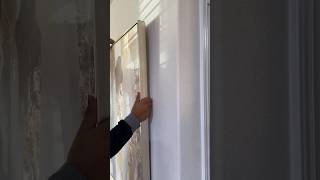 Using Adjustable Picture Hanging Wire to hang pictures. #hangingpictures #homedecorideas  #decortips