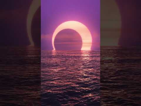 Purple sunset and solar eclipse over the ocean! #solareclipse