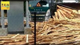 拖格羅厘車斗翻覆 木板壓毀診所籬笆