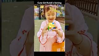 Adorable Genius! Watch This Little Girl Solve Rubik's Cube Like a Pro 😍🧩 #CubeMaster