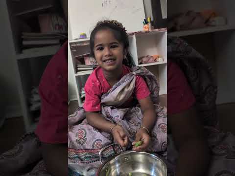 🌿💚  “The secret ingredient? Her smile while shelling peas with me 💕👩‍👧” #CookingWithLove#littlechef
