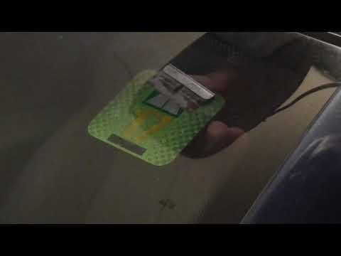 Swiss motorway vignette removal and transfer to other car
