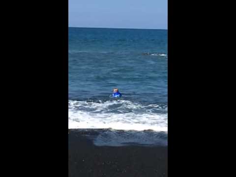 Dylan playing at kiholo bay - Big Island