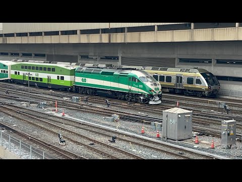GO Train racing with UP Express train out of Toronto Union Station
