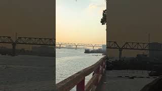 "Golden hour by the riverside 💛"#RiverVibes #GoldenEvening #NatureLover #ShipAndSky #PeacefulMoments