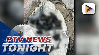 Authorities recover a sack containing bones from Taal Lake