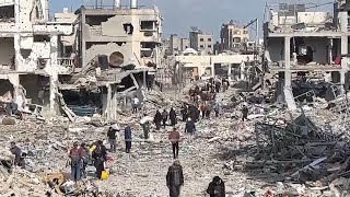 Residents returning to Jabaliya refugee camp in northern Gaza find their homes reduced to rubble