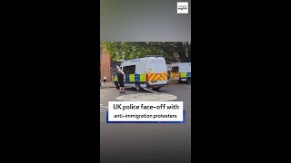 Police face-off with anti-immigration protesters