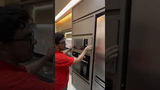 Concealed microwave in kitchen #shorts #microwave #interiordesign #interiorwooddesign owave