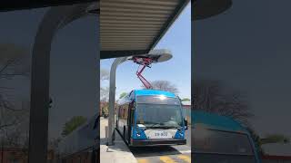 Charging arm connects to a STM 36 Monk bus with a trainee driver #stm #busesofmontreal #vehicles