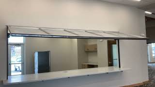 Watch the smooth operation of a counter swing door