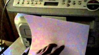 How to load and use legal or business sized paper in a Brother DCP 7030 laser printer