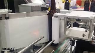 Glass Bottle Labelling Machine | Pneumatic Wrap Around Labelling Machine | Solo Labeller Technology