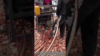 Machine Strips Copper Coating From Black Pipes for Efficient Recycling