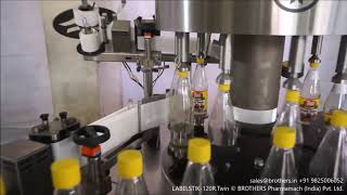LABELSTIK-120R.Twin  Two Head Rotary Labelling Machine to apply Twin Label on  Round or Flat Bottle