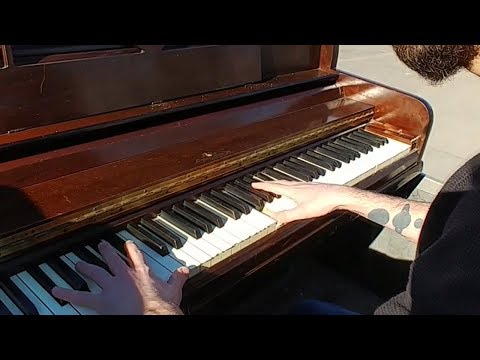 playing piano in the back of a pickup truck