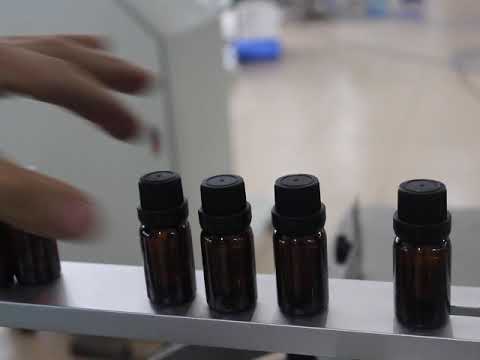 棕色精油瓶灌装旋盖后成品视频
