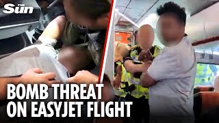 Moment passengers pin down man who yelled 'I've got a BOMB' on UK flight