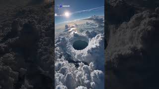 A portal in the sky or nature’s mystery? 🌤️✨#clouds #sky hole #surreal #aiview #invideoAI#usa #ai