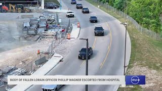 Body of fallen Lorain officer Phillip Wagner escorted from MetroHealth Medical Center
