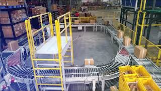 High-Speed Tote Conveyor System by Falcon Autotech