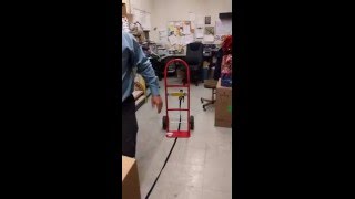 How do you safely move items with your hand truck or dolly?
