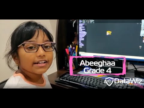 Abeeghaa creating a Christmas animation using Scratch