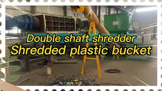 "Shredding Plastic Bottles with Dual Shaft Shredder: Eco-Friendly Waste Management Solution"