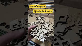 The  new JTech.44 watt laser Cutting 1/4 inch ply into snowflakes.  #woodworking