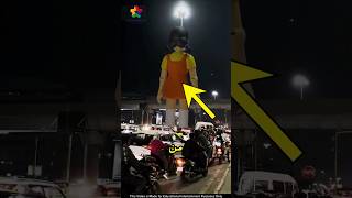 شارع يتحول إلى لعبة الحبار: هل تجرؤ على العبور؟ 😱