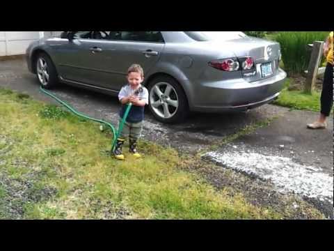 Ryan with a hose - watch out!.mp4