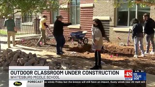 Whitesburg Middle School students working on outdoor classroom