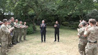 Zelensky and Starmer meet with Ukraine-bound troops at Downing Street | AFP